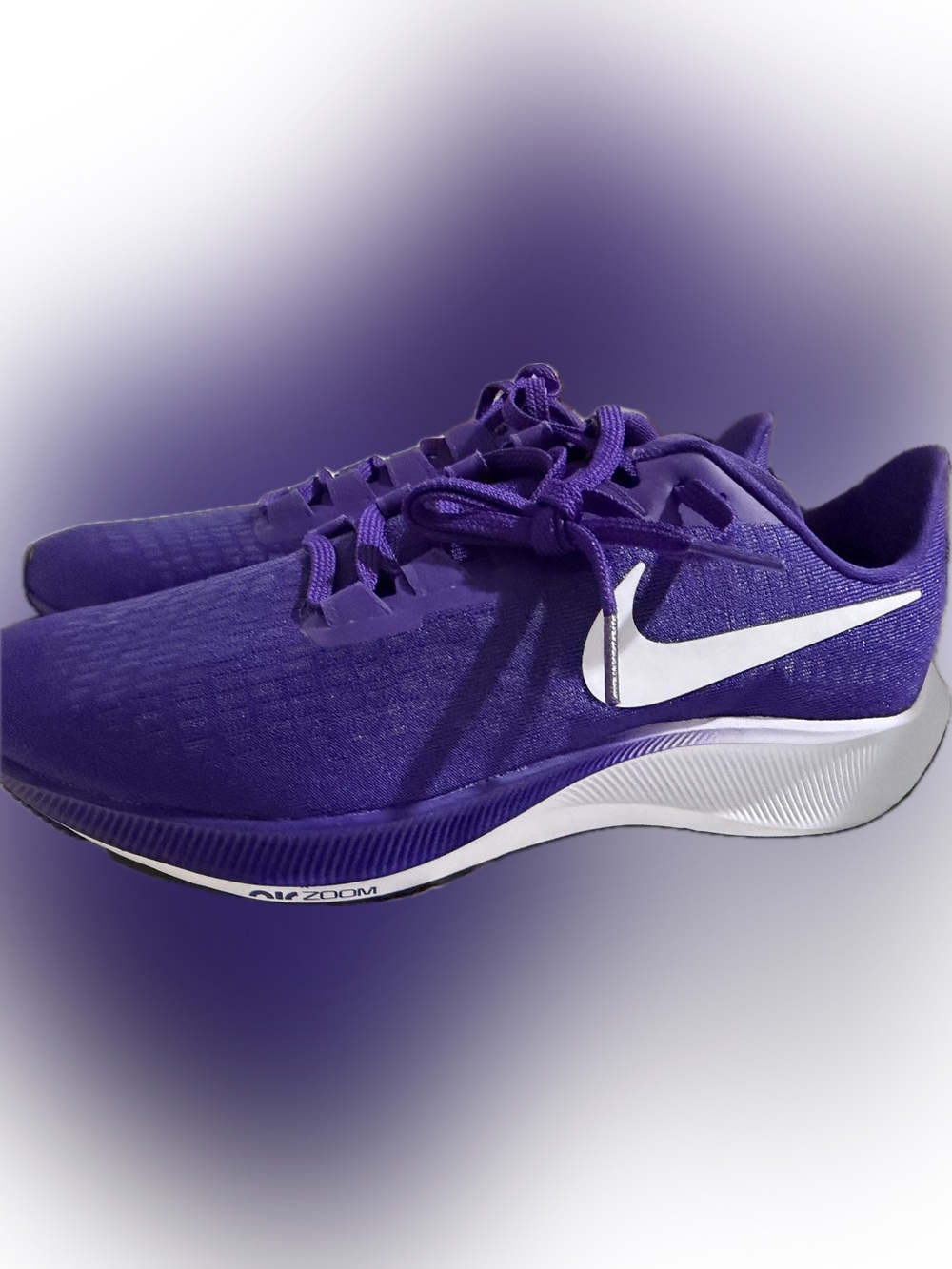 Nike Women's Purple Running Shoes with White Swoosh
